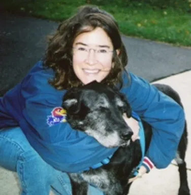 Renee Boothroyd, retired board member, with senior dog