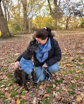 dog with mom wearing matching scarves