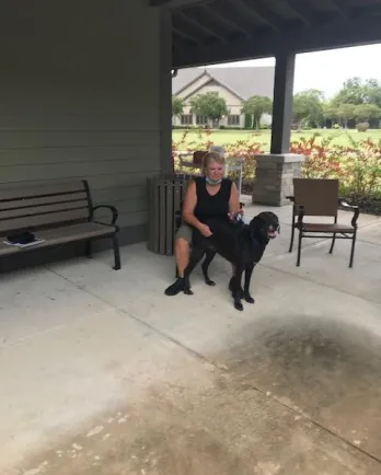 Black lab mix Dolly and adopter