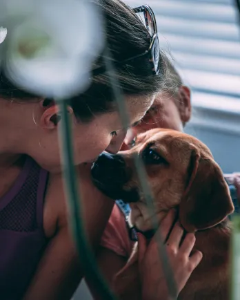 Lady and daughter with dog