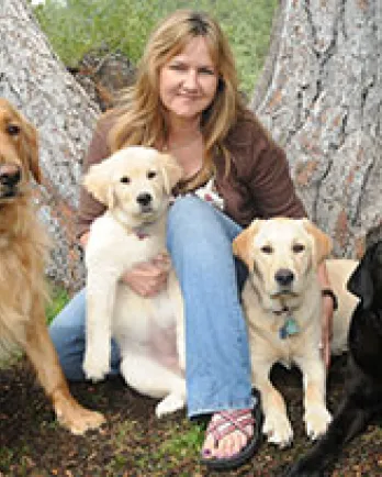 Jennifer Kachnic and her four dogs